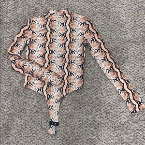Peach snake print body suit